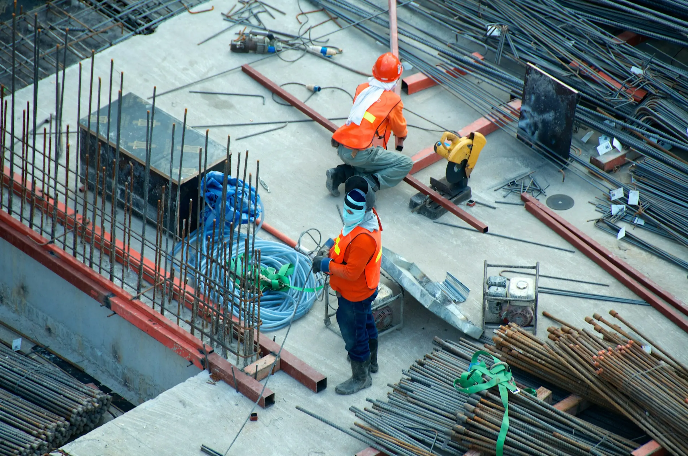 High-res construction site with crane and steel structures